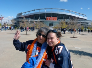 credit: stranger lol but my camera; me and mom at a bronco game going all nuts in advance. it's our thing